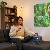 JMGO N1S 4K Portable Projector with RGB Triple Laser Optics, Google TV &amp; Intelligent Auto Adjustment — Lifestyle